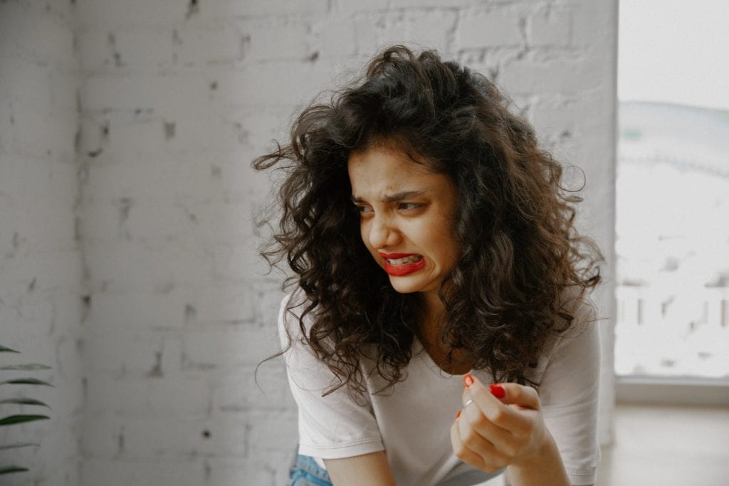 woman looking disgusted